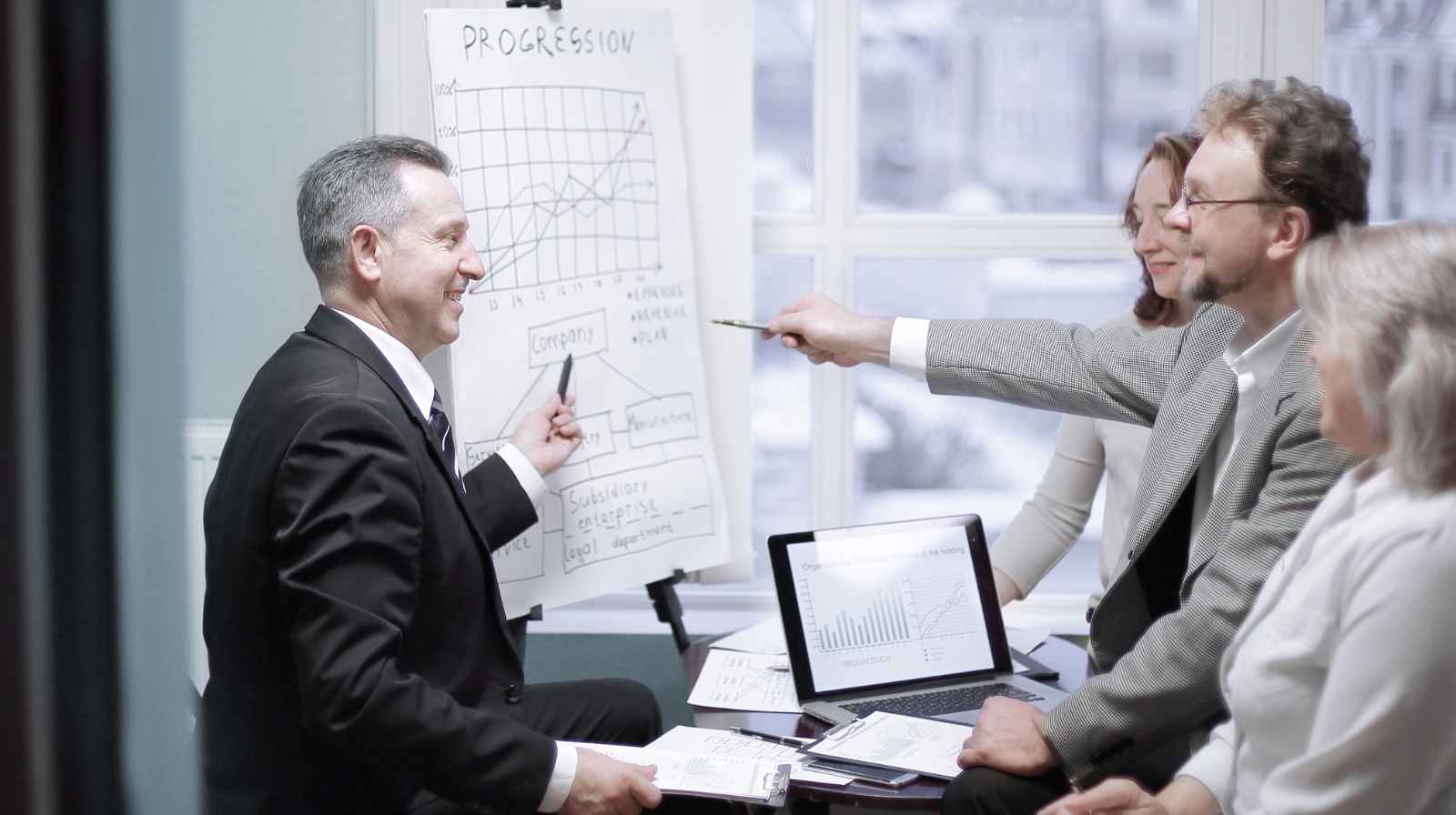 Apport de titres à une holding : report d'imposition et conditions